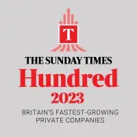 The Sunday Times 100 2023 logo in red on grey